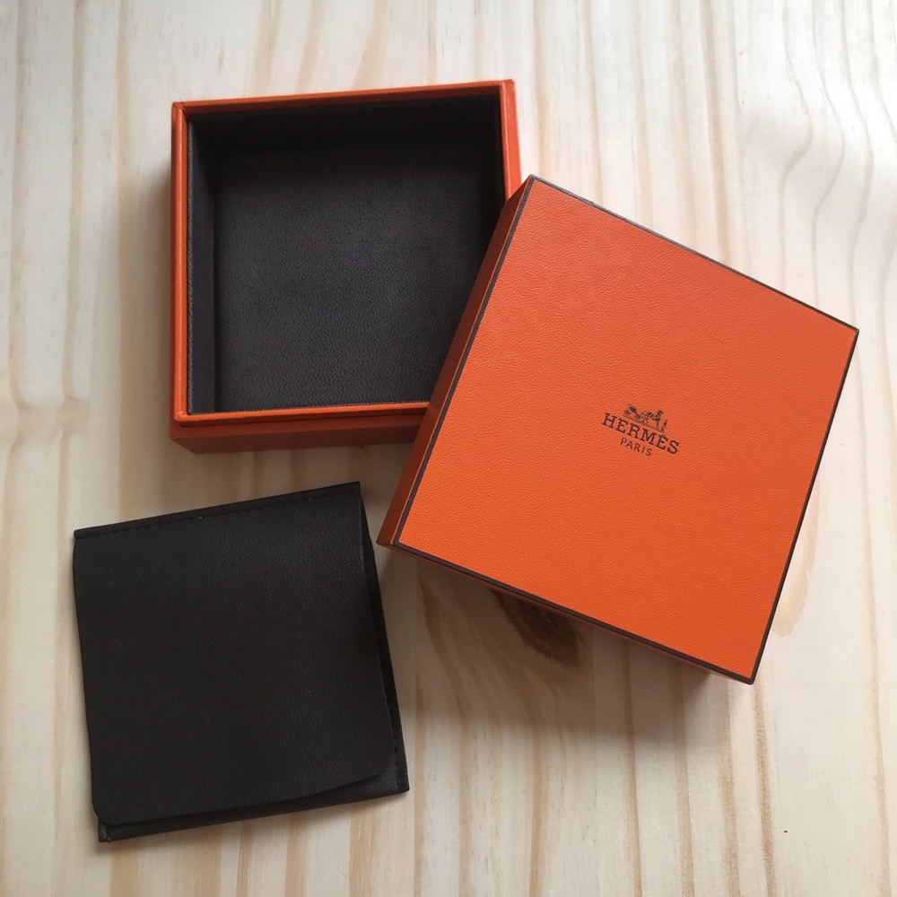 Hermès orange jewelry box with pouch.